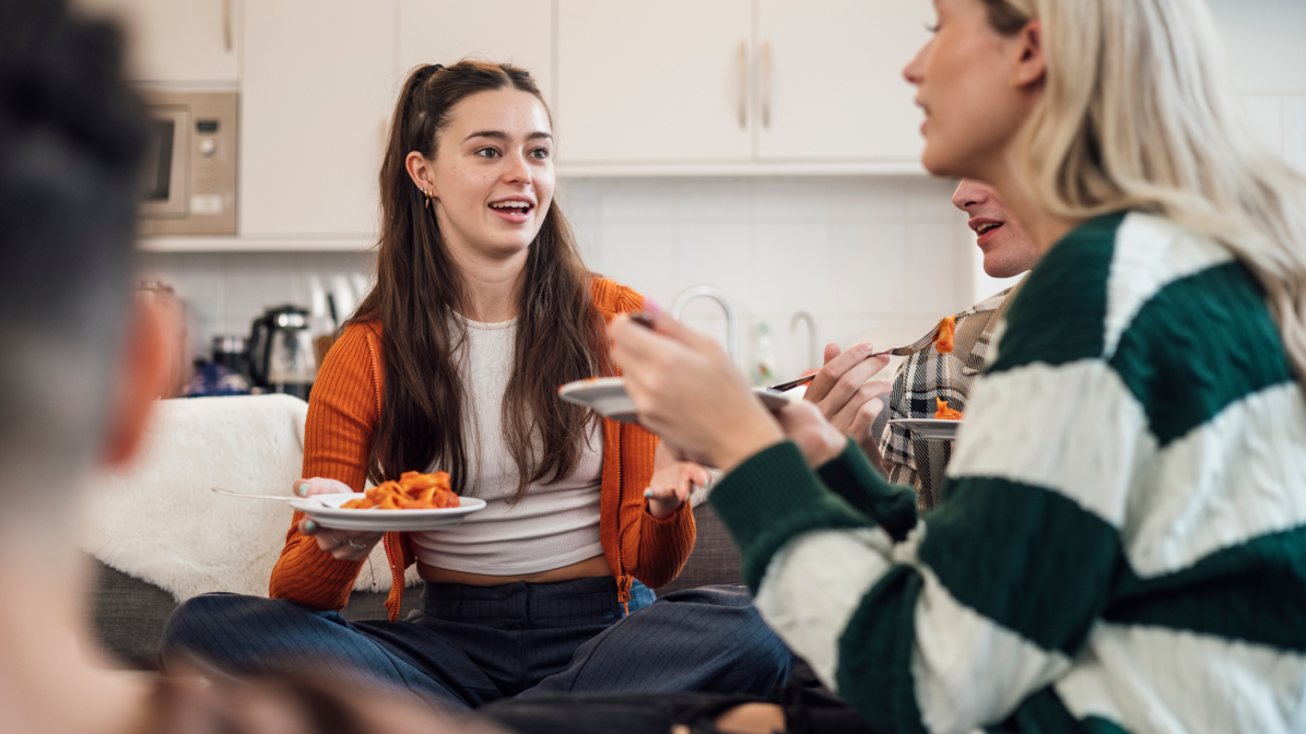 Industry_Marketing_Article_Accommodation_Strategies_For_Lasting_Brand_Recognition_Image_4 A group of students sat talking in a communal kitchen area
