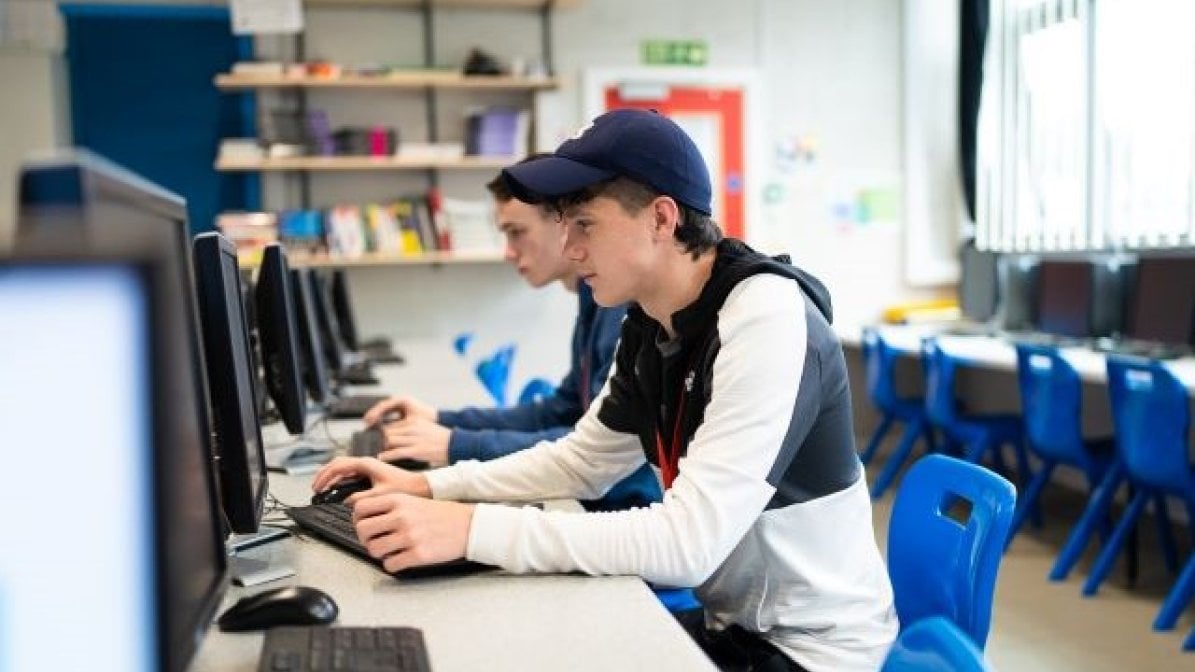 Students using computers in classroom