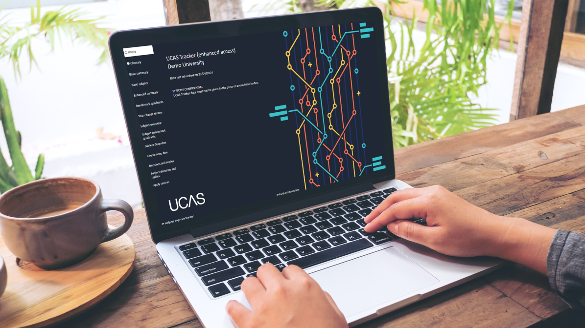 UCAS Tracker Dashboard Person using laptop - displaying UCAS Tracker